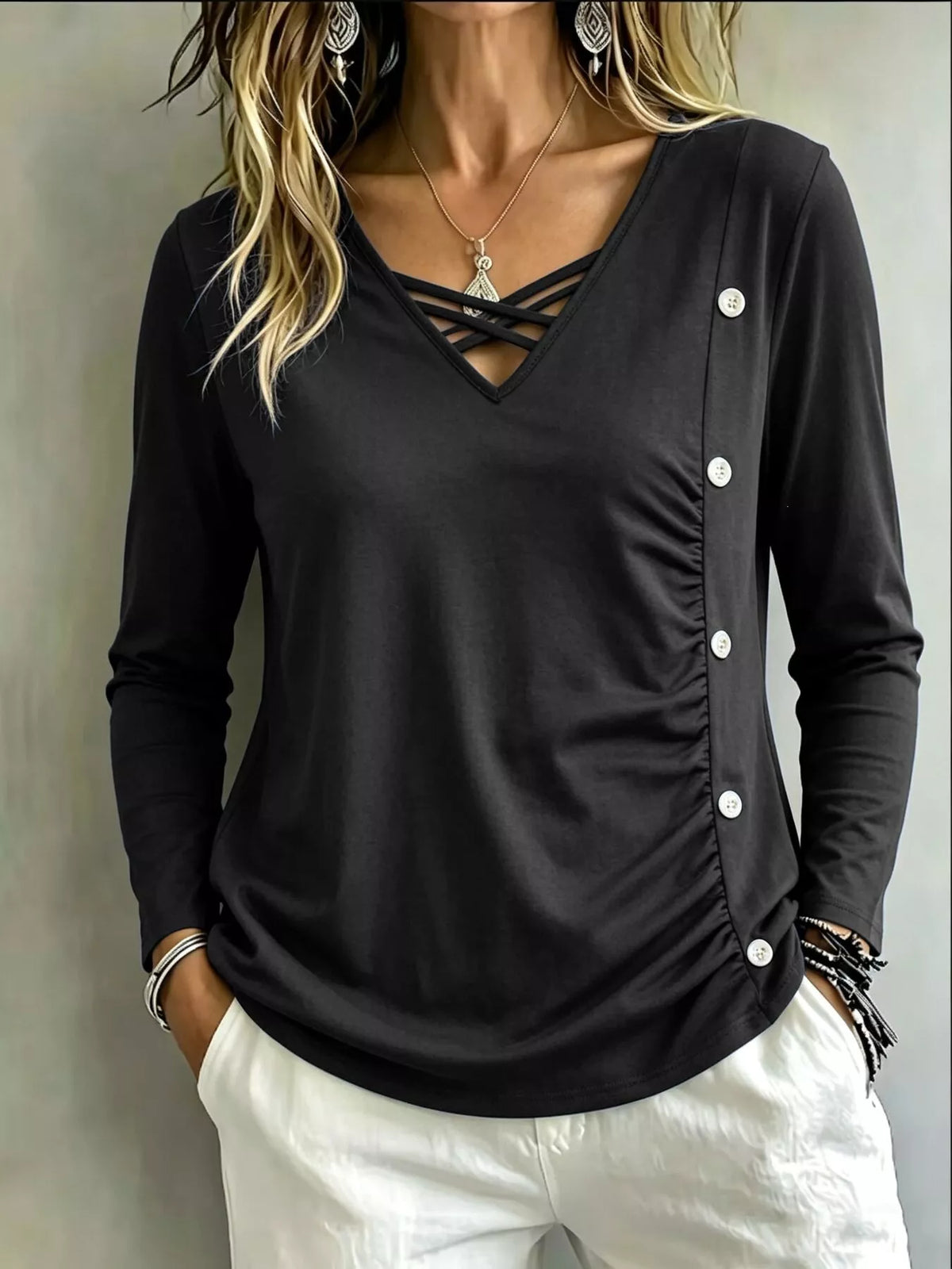 Plus size criss-cross long sleeve top with decorative buttons for women