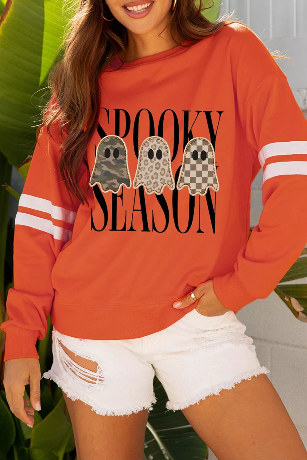 Spooky Season ghost graphic Halloween sweatshirt with varsity striped sleeves